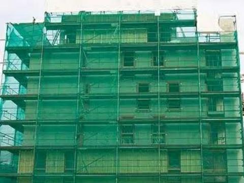 Interesting Facts Why Under Construction Building Is Covered With Green Curtain 2